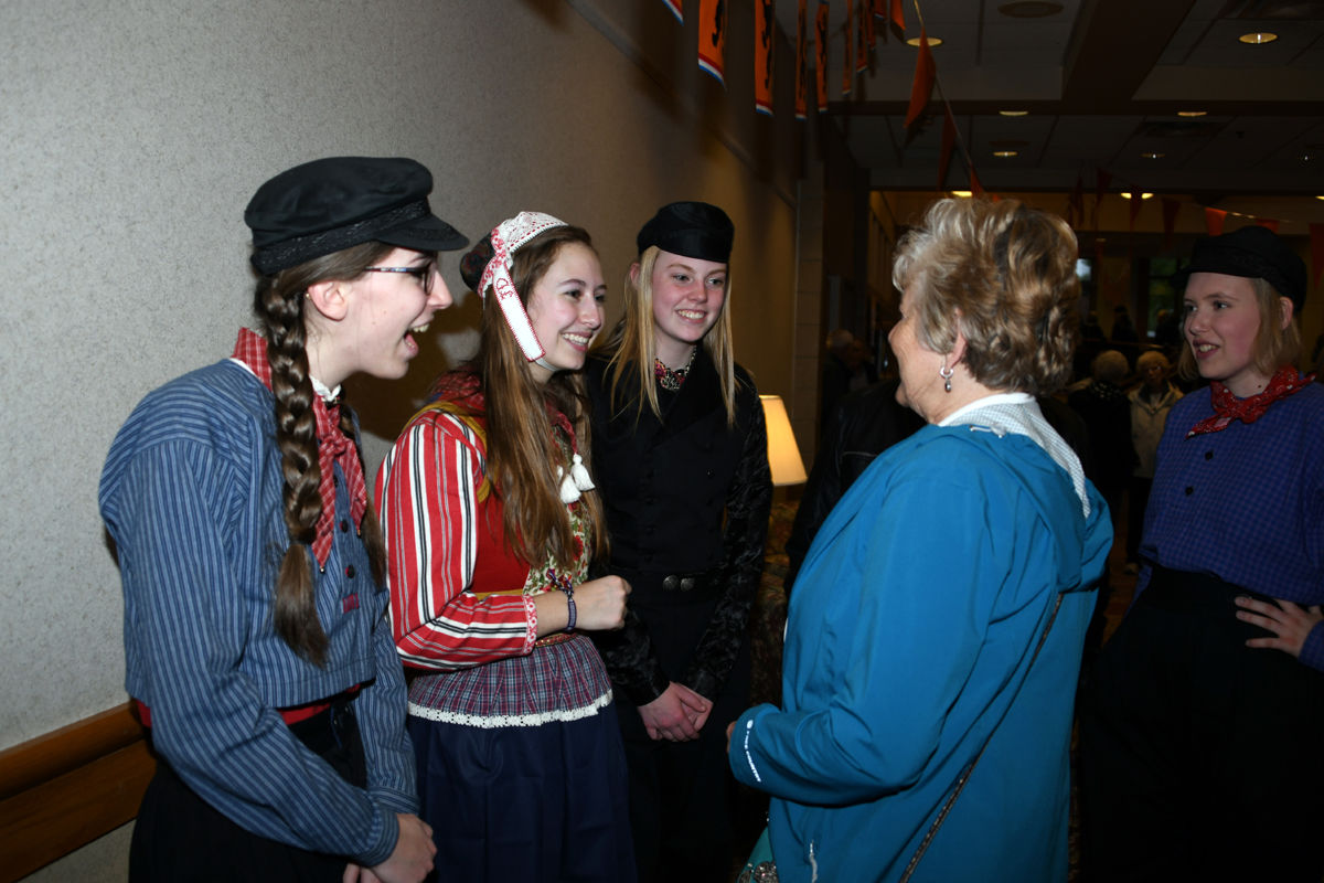 144 Sylvia Epp visits with the Dutch dancers.JPG